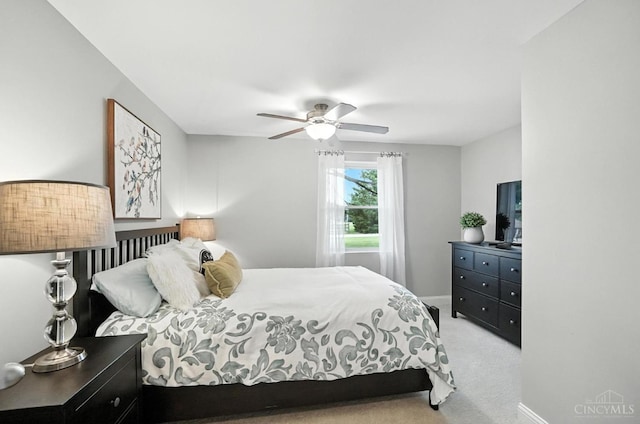 8135 Faller Rd, Hamilton Twp, OH 45039 - carpeted bedroom with ceiling fan and baseboards