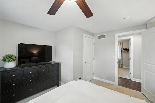 8135 Faller Rd, Hamilton Twp, OH 45039 - carpeted bedroom featuring baseboards and a ceiling fan