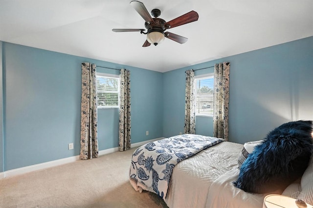 8135 Faller Rd, Hamilton Twp, OH 45039 - bedroom with multiple windows, carpet, and ceiling fan