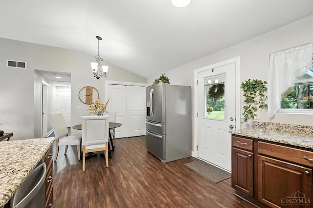 8135 Faller Rd, Hamilton Twp, OH 45039 - kitchen featuring stainless steel appliances, dark wood-style floors, lofted ceiling, a chandelier, and light stone countertops