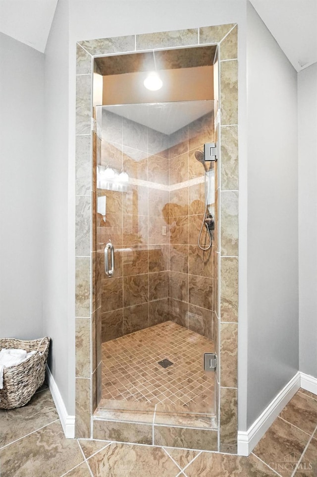 8135 Faller Rd, Hamilton Twp, OH 45039 - full bathroom with a stall shower and tile patterned flooring