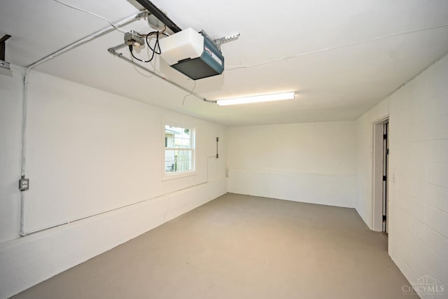64 Craig Dr, Hamilton, OH 45013 - garage featuring a garage door opener