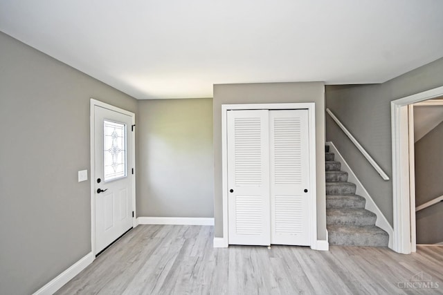 64 Craig Dr, Hamilton, OH 45013 - foyer entrance with wood finished floors and stairs