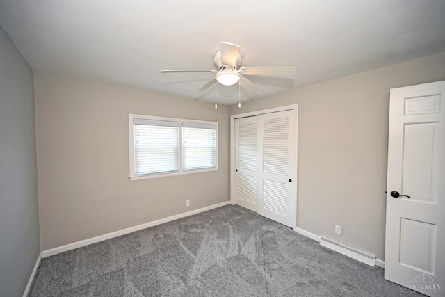 64 Craig Dr, Hamilton, OH 45013 - unfurnished bedroom featuring a baseboard radiator, a closet, carpet floors, and a ceiling fan
