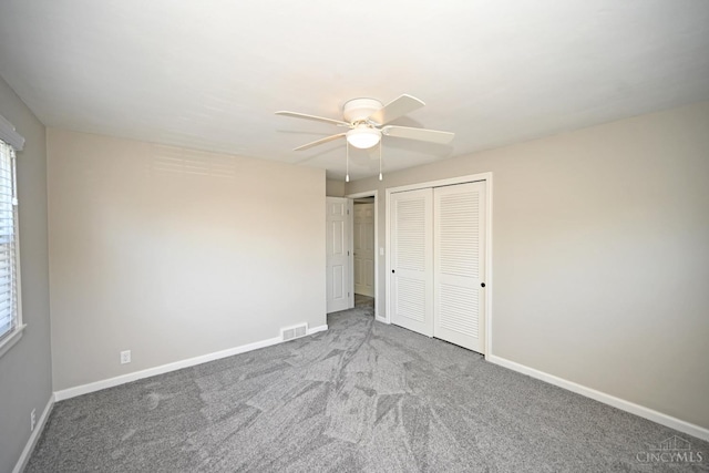 64 Craig Dr, Hamilton, OH 45013 - unfurnished bedroom featuring carpet floors and ceiling fan