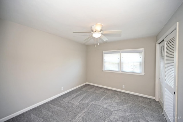 64 Craig Dr, Hamilton, OH 45013 - unfurnished bedroom featuring a closet, carpet floors, and a ceiling fan