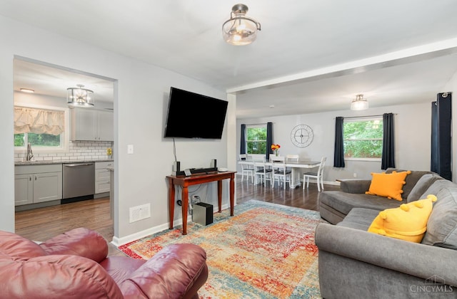 3340 Algus Ln, Green Twp, OH 45248 - living room with wood finished floors and a chandelier