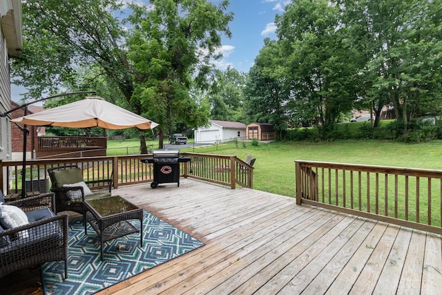 3340 Algus Ln, Green Twp, OH 45248 - deck featuring a grill, outdoor lounge area, a fenced backyard, view of scattered trees, and an outdoor structure