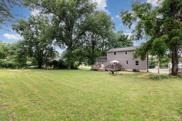 3340 Algus Ln, Green Twp, OH 45248 - view of green lawn with a wooden deck