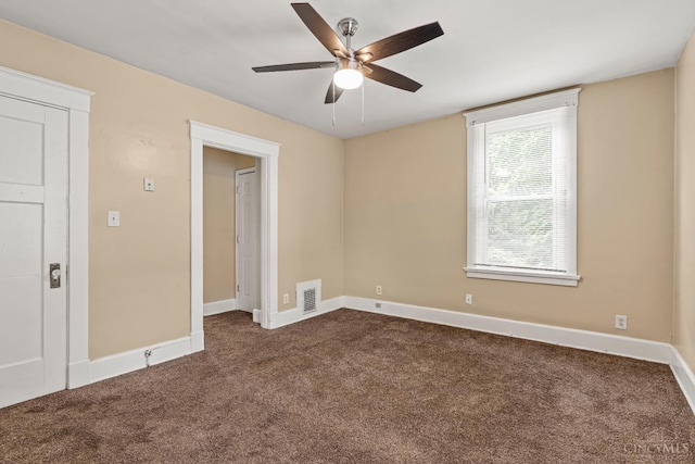 5824 Saranac Ave, Cincinnati, OH 45224 - unfurnished room featuring dark carpet and a ceiling fan