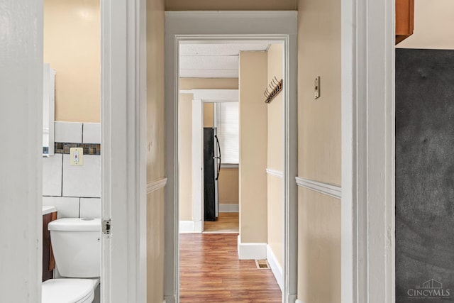 5824 Saranac Ave, Cincinnati, OH 45224 - bathroom featuring toilet and wood finished floors