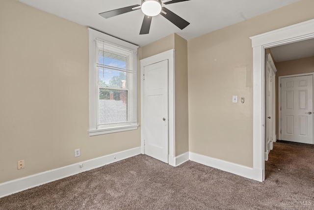 5824 Saranac Ave, Cincinnati, OH 45224 - unfurnished bedroom with dark carpet and ceiling fan