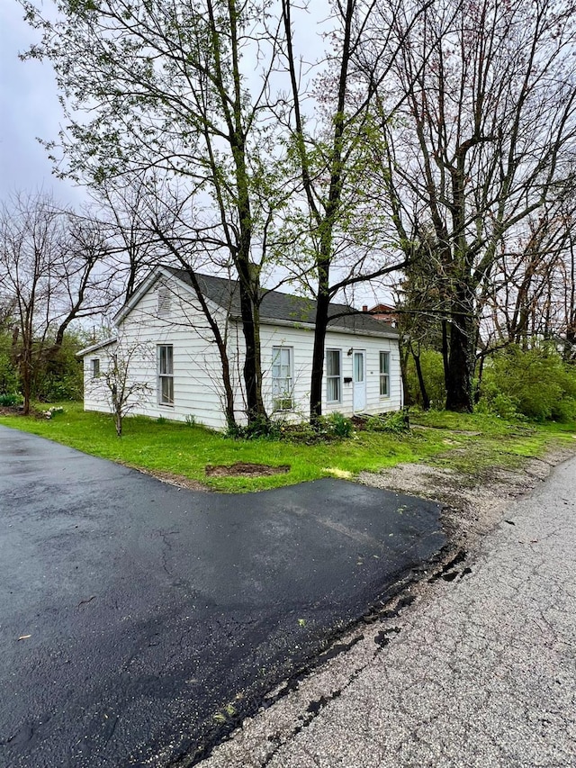 202 E 2nd St, Georgetown, OH 45121 - view of property exterior featuring a lawn