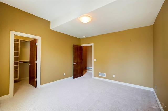 4994 Maxwell Dr, Mason, OH 45040 - unfurnished bedroom with a walk in closet and light colored carpet