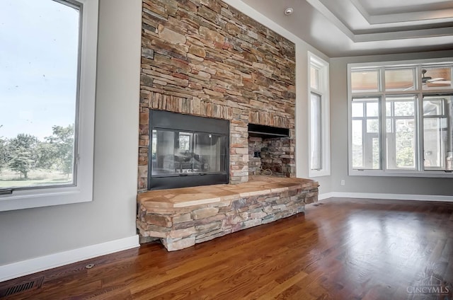 4994 Maxwell Dr, Mason, OH 45040 - living room featuring wood finished floors, a stone fireplace, and healthy amount of natural light