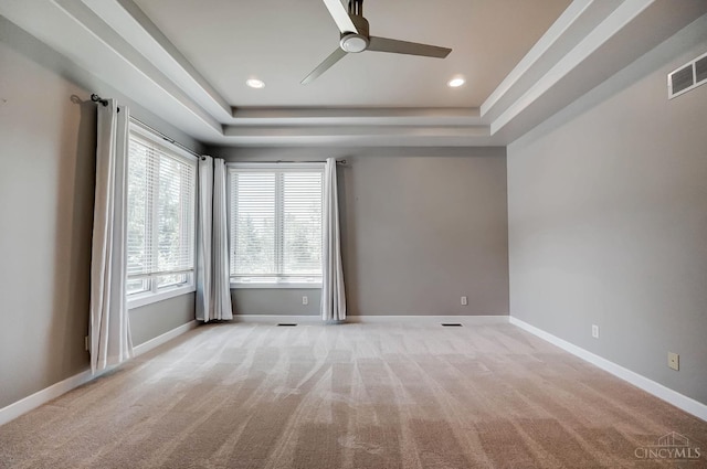 4994 Maxwell Dr, Mason, OH 45040 - empty room with ceiling fan, a tray ceiling, light colored carpet, and recessed lighting