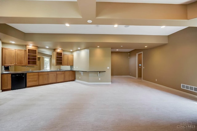 4994 Maxwell Dr, Mason, OH 45040 - kitchen with dishwasher, open shelves, light carpet, brown cabinets, and open floor plan