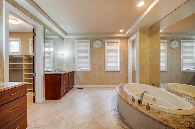 4994 Maxwell Dr, Mason, OH 45040 - bathroom with vanity, a whirlpool tub, recessed lighting, and tile patterned floors