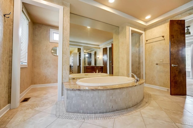4994 Maxwell Dr, Mason, OH 45040 - bathroom with a garden tub, tile patterned floors, and recessed lighting