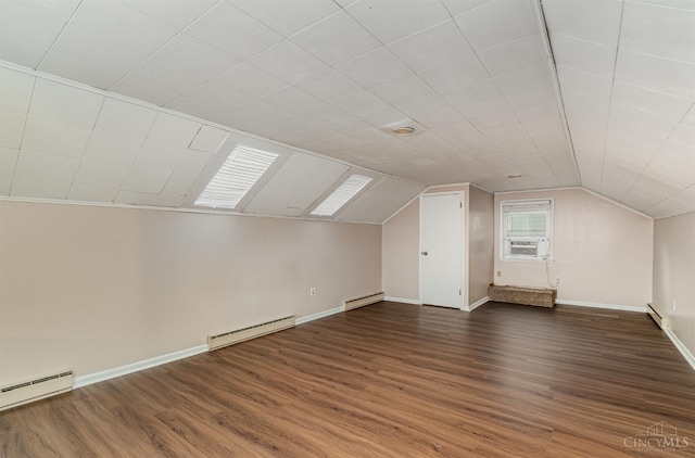 6846 Bryn Mawr Dr, Springfield Twp, OH 45224 - additional living space featuring baseboard heating, wood finished floors, and vaulted ceiling