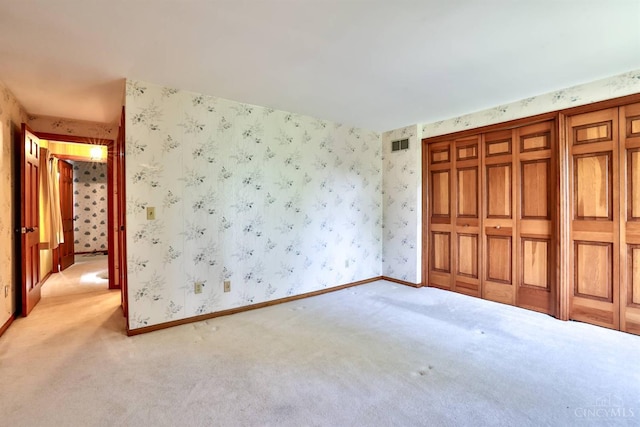 5868 Greenlawn Rd, Fairfield Twp, OH 45011 - unfurnished bedroom featuring light carpet and wallpapered walls