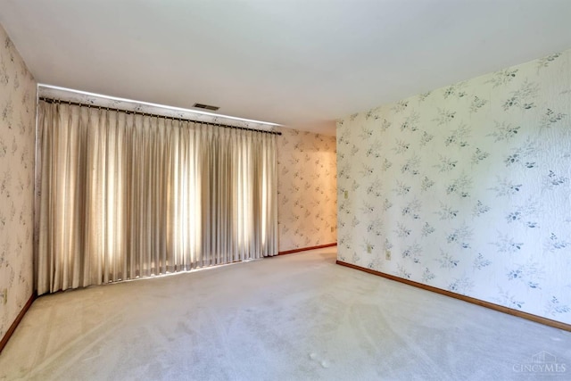5868 Greenlawn Rd, Fairfield Twp, OH 45011 - spare room featuring carpet and wallpapered walls