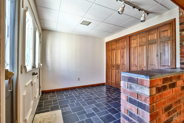 5868 Greenlawn Rd, Fairfield Twp, OH 45011 - entrance foyer with rail lighting and baseboards
