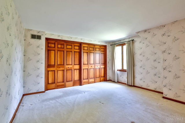 5868 Greenlawn Rd, Fairfield Twp, OH 45011 - unfurnished bedroom with carpet and wallpapered walls