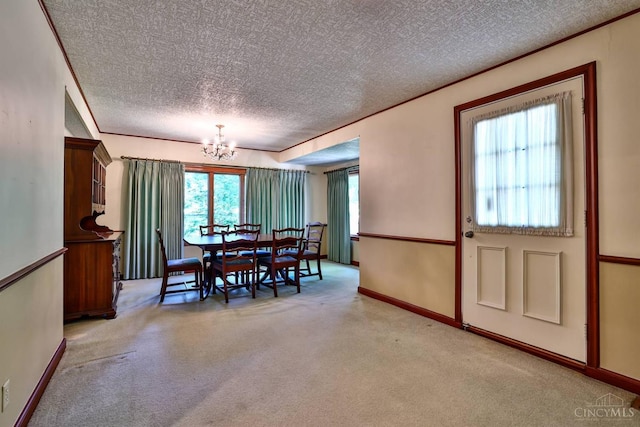5868 Greenlawn Rd, Fairfield Twp, OH 45011 - dining room with a chandelier, a textured ceiling, and carpet flooring