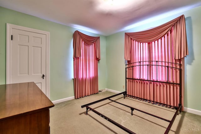 5868 Greenlawn Rd, Fairfield Twp, OH 45011 - unfurnished bedroom featuring baseboards and carpet floors