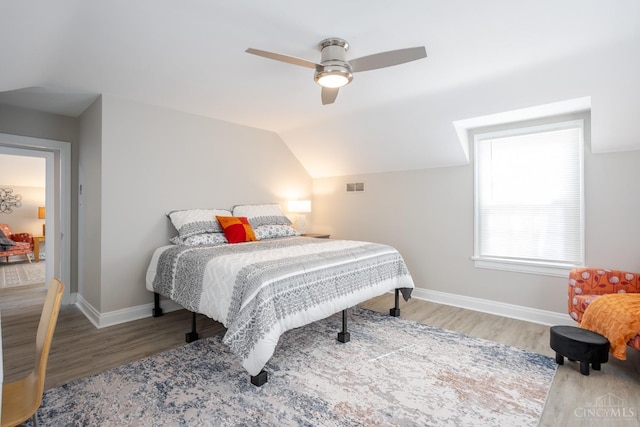 1744 Northampton Dr, Cincinnati, OH 45237 - bedroom with wood finished floors, lofted ceiling, and a ceiling fan