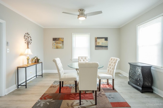 1744 Northampton Dr, Cincinnati, OH 45237 - dining room featuring light wood-style flooring, crown molding, and a ceiling fan