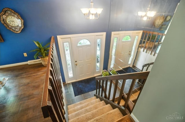 1092 Fox Run Rd, Miami Twp, OH 45150 - entryway with a chandelier, stairs, wood finished floors, and a high ceiling