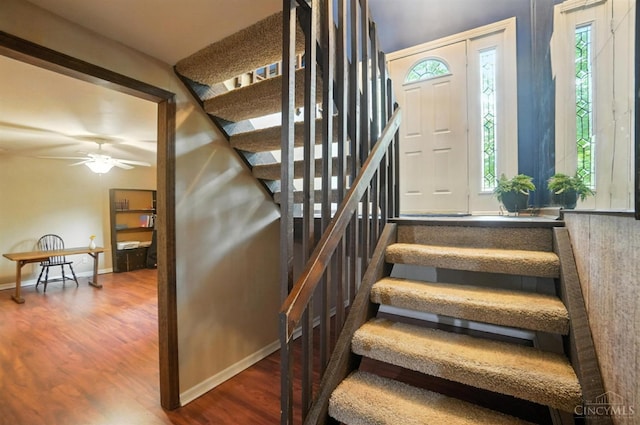 1092 Fox Run Rd, Miami Twp, OH 45150 - staircase featuring healthy amount of natural light, wood finished floors, and a ceiling fan