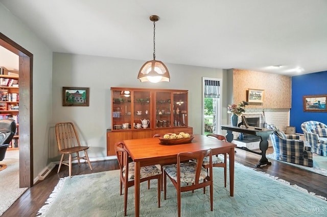 1092 Fox Run Rd, Miami Twp, OH 45150 - dining space with a fireplace and wood finished floors