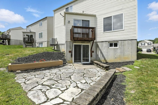 2317 Garrison Dr, Springfield Twp, OH 45231 - back of house with a patio and a yard