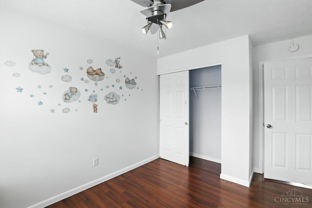 2317 Garrison Dr, Springfield Twp, OH 45231 - unfurnished bedroom featuring wood finished floors, a closet, and a ceiling fan