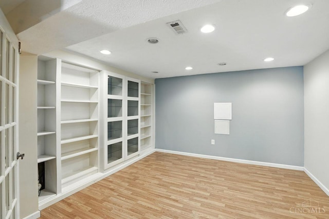 2317 Garrison Dr, Springfield Twp, OH 45231 - unfurnished room featuring wood finished floors and recessed lighting