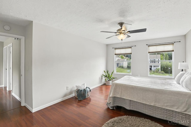 2317 Garrison Dr, Springfield Twp, OH 45231 - bedroom with wood finished floors, a ceiling fan, and a textured ceiling