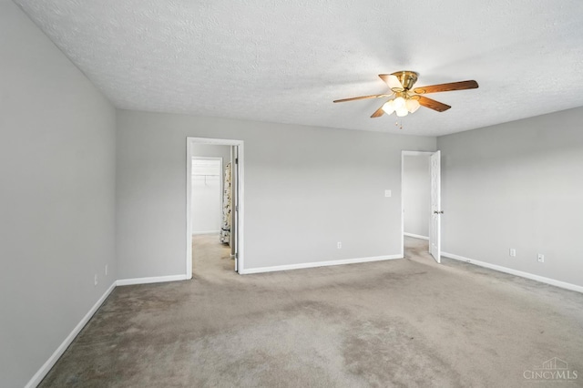 8939 Perry Ave, Franklin, OH 45005 - carpeted spare room with a ceiling fan and a textured ceiling