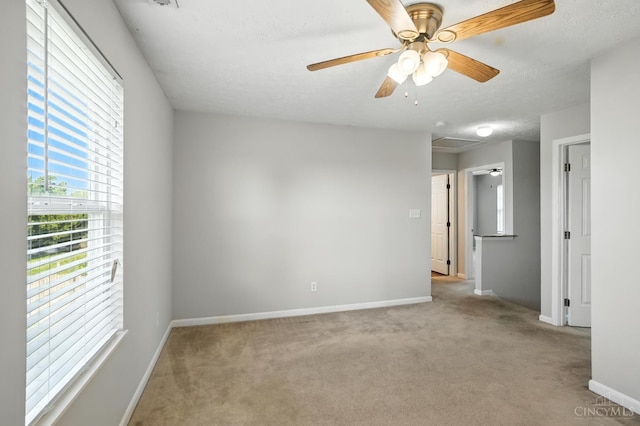 8939 Perry Ave, Franklin, OH 45005 - carpeted empty room with a ceiling fan and a textured ceiling
