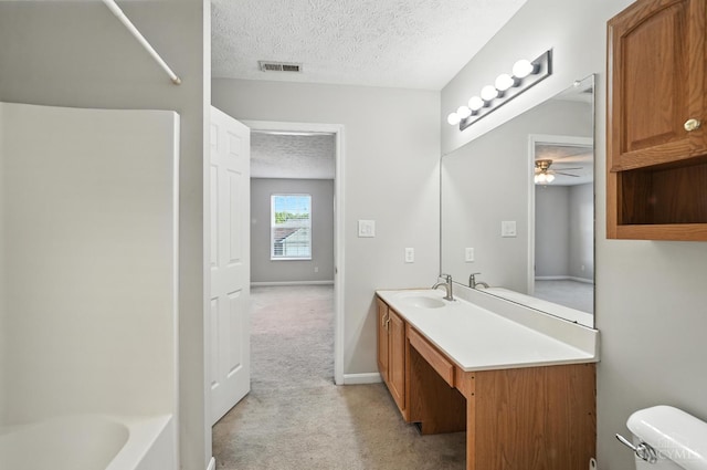 8939 Perry Ave, Franklin, OH 45005 - bathroom with a ceiling fan, a textured ceiling, vanity, and shower / bath combination