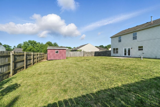 8939 Perry Ave, Franklin, OH 45005 - fenced backyard featuring french doors and a shed