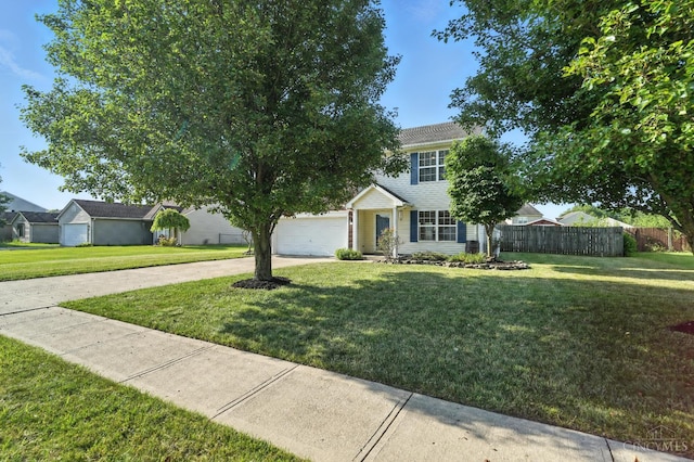8939 Perry Ave, Franklin, OH 45005 - view of front of property featuring concrete driveway and an attached garage