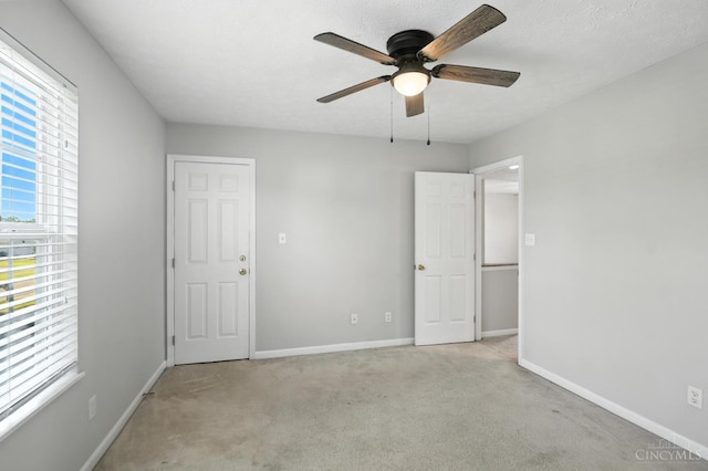 8939 Perry Ave, Franklin, OH 45005 - unfurnished bedroom featuring carpet and ceiling fan