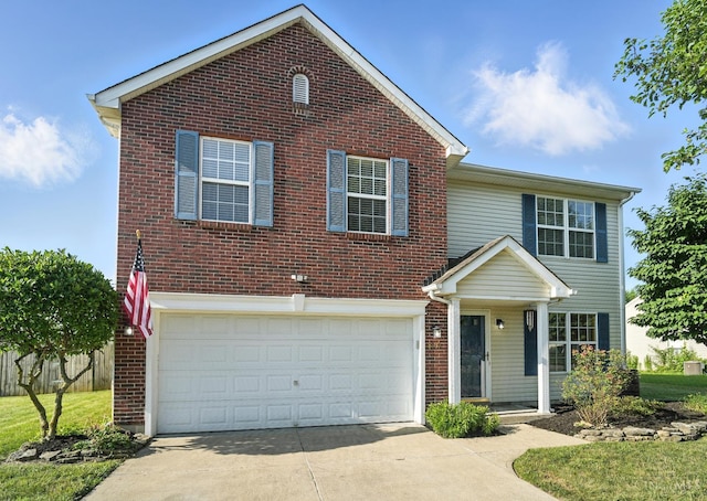 8939 Perry Ave, Franklin, OH 45005 - traditional home with driveway, brick siding, and a garage