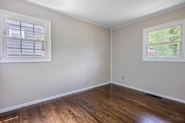 3803 Hampton Pl, Middletown, OH 45042 - unfurnished room featuring crown molding and dark wood-type flooring