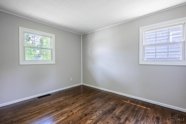 3803 Hampton Pl, Middletown, OH 45042 - spare room with ornamental molding and dark wood-type flooring