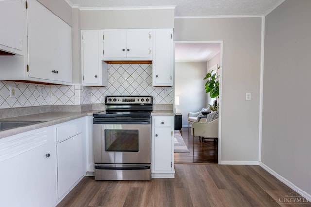 3803 Hampton Pl, Middletown, OH 45042 - kitchen featuring stainless steel electric range oven, dark wood-style flooring, and light countertops