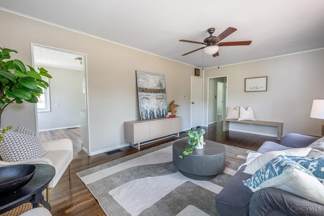 3803 Hampton Pl, Middletown, OH 45042 - living area with wood finished floors, a ceiling fan, and ornamental molding